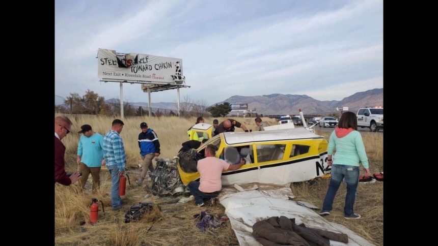 A small plane crashed in Roy, Utah along Interstate 15 Sunday afternoon. The plane hit a billboard upon takeoff according to Utah Highway Patrol. Photo courtesy Tyson Bolkcom