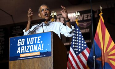 Former US President Barack Obama speaks during a campaign event in Phoenix