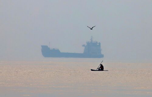 A commercial vessel appears anchored in the Strait of Hormuz off Bandar Abbas