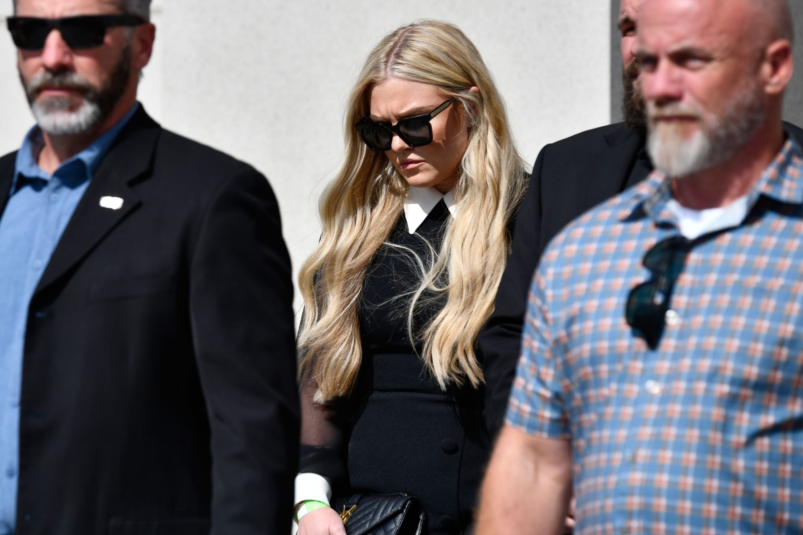 Erika Kirk leaves the Fourth District Courthouse in Provo, Utah, on July 6 after a hearing for Tyler Robinson, accused in the fatal shooting of Charlie Kirk.