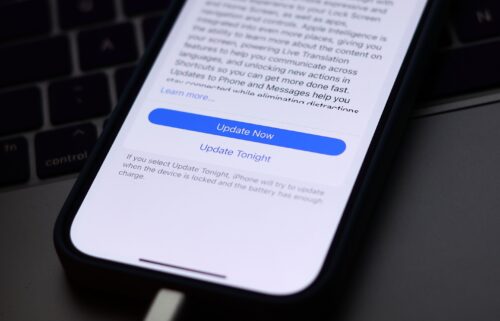 Update screen is seen displayed on a phone screen in this illustration photo taken in Krakow