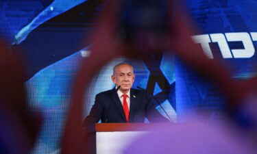 Israeli Prime Minister and Likud party leader Benjamin Netanyahu reacts to exit polls